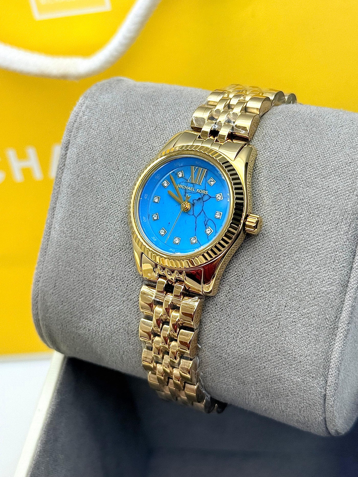 Michael Kors Lexington Women’s Quartz Gold Tone Stainless Steel Blue Dial