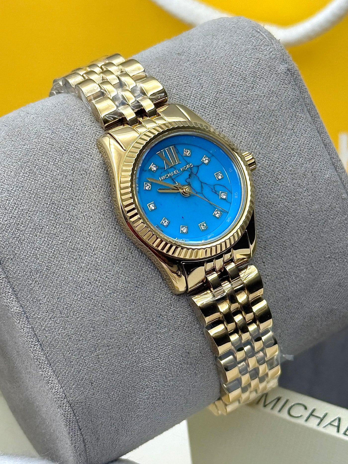 Michael Kors Lexington Women’s Quartz Gold Tone Stainless Steel Blue Dial