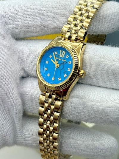 Michael Kors Lexington Women’s Quartz Gold Tone Stainless Steel Blue Dial